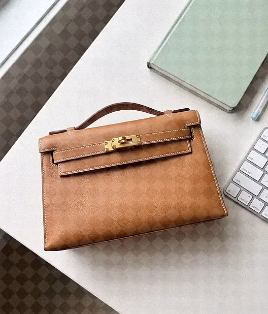HERM&Egrave;S Kelly Pochette Gold Swift Gold hardware G 2026 photo review